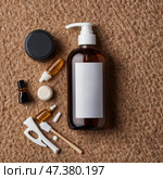 Various natural skincare products arranged neatly on a textured surface with a focus on organic beauty care. Стоковое AI-изображение, AI-художник Сергей Толмачёв / Фотобанк Лори