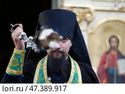 Belarus, Gomel city, St. Nicholas Monastery, a religious Orthodox holiday "Palm Sunday" 18.06.2016 year. Priest with censer. Редакционное фото, фотограф Лазаренко Светлана / Фотобанк Лори