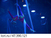Belarus, Gomel, June 13, 2017 Palace of Culture, performance of the Abel Folk Circus,A girl dancing a dance on canvases.Children's sports. Girl gymnast. Straight tricks. Редакционное фото, фотограф Лазаренко Светлана / Фотобанк Лори
