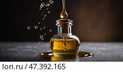 Golden oil dripping from a corked glass bottle onto a dark surface in a minimalistic setting. Стоковое AI-изображение, AI-художник Сергей Толмачёв / Фотобанк Лори