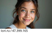 A Young Girl With Striking Blue Eyes Radiates Joy Through Her Warm Smile. Стоковое AI-изображение, AI-художник Sergey Grishin / Фотобанк Лори