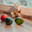 Bright colorful Easter eggs with shadows, children's soft toy bunny on table, spring holiday. Стоковое фото, фотограф irisff / Фотобанк Лори