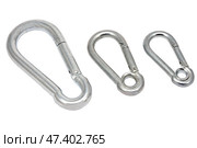Альпинистские карабины на белом фоне. Climber carabiners on a white background. Стоковое фото, фотограф Татьяна Д / Фотобанк Лори