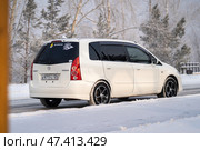 KRASNOYARSK, RUSSIA - February 2, 2025: White Mazda Premacy. Редакционное фото, фотограф Плотников Дмитрий / Фотобанк Лори