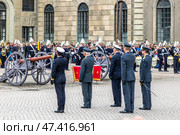 STOCKHOLM, SWEDEN - APRIL 30, 2018: Celebrating the 72nd birthday of King Carl XVI Gustaf. King Carl XVI Gustaf of Sweden and his son Prince Carl Philip, Duke of Varmland greet their subjects on the square in front of the Royal Palace. Редакционное фото, фотограф Сергей Комаров / Фотобанк Лори