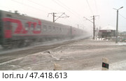 Russian Railways is the composition of trade passenger cars, rails, sleepers moving lights winter. Стоковое видео, видеограф Алексей Сергеев / Фотобанк Лори