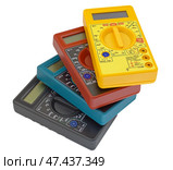 Цифровые мультиметры на белом фоне. Digital  multimeters on a white background. Стоковое фото, фотограф Татьяна Д / Фотобанк Лори