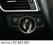 Novosibirsk, Russia -  March  23, 2024: Mercedes-Benz GL-class,  close-up of headlight  buttons. modern car interior. Стоковое фото, фотограф Виталий Сова / Фотобанк Лори