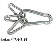 Альпинистские карабины на белом фоне. Climber carabiners on a white background. Стоковое фото, фотограф Татьяна Д / Фотобанк Лори