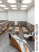 Interior of reading room of Vyborg Library (2023 год). Редакционное фото, фотограф EugeneSergeev / Фотобанк Лори