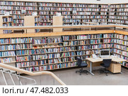 Interior of reading room is full og books. Vyborg Library (2023 год). Редакционное фото, фотограф EugeneSergeev / Фотобанк Лори
