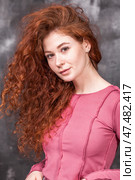 Studio portrait of a red-haired girl. Стоковое фото, фотограф Андрей Аркуша / Фотобанк Лори