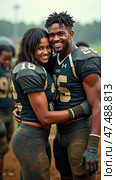 Couple of football players hug each other in the mud. Стоковое AI-изображение, AI-художник Sergey Grishin / Фотобанк Лори