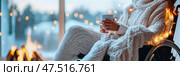 Winter Solitude: A Cozy Respite, Finding Warmth and Peace by the Fireplace, a Moment of Serenity and Reflection. Стоковое AI-изображение, AI-художник Данила Большаков / Фотобанк Лори