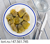 Artichoke cores baked in oven are served with spicy garlic alioli sauce. Стоковое фото, фотограф Яков Филимонов / Фотобанк Лори