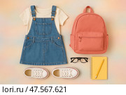 Stylish Outfit Flat Lay Featuring Denim Jacket, Striped Shirt, and Accessories Perfect for Casual Outings. Стоковое AI-изображение, AI-художник Юлия Гапеенко / Фотобанк Лори