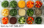 Vibrant Buddha bowl preparation featuring kale, quinoa, vegetables. Разноцветные ингредиенты для яркой чаши Будды аккуратно разложены по контейнерам, демонстрируя капусту, киноа и разнообразные свежие овощи, готовые к приготовлению блюд. Стоковое AI-изображение, AI-художник Katsiaryna Repich / Фотобанк Лори