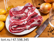 Raw beef brisket served at table. Стоковое фото, фотограф Яков Филимонов / Фотобанк Лори