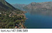Flying over Kotor bay in Montenegro (2022 год). Стоковое видео, видеограф Михаил Коханчиков / Фотобанк Лори