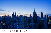 Nighttime timelapse of the Malaysian capital Kuala Lumpur. Стоковое видео, видеограф Mikhail Davidovich / Фотобанк Лори