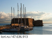 Venetian fortress Koules, Heraklion, Crete, Greece. Landscape of Venetian castle and boats. Стоковое фото, фотограф Светлана Брайман / Фотобанк Лори