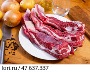Raw beef brisket served at table. Стоковое фото, фотограф Яков Филимонов / Фотобанк Лори