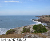 Rocky Coastline and Open Sea View from Hill in Mui Ne, Vietnam. Стоковое фото, фотограф Ирина Кононова / Фотобанк Лори