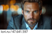 Close-up Portrait of a Man with Blue Eyes and Graying Hair. Стоковое AI-изображение, AI-художник Данила Большаков / Фотобанк Лори