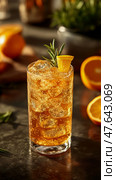 Refreshing Orange Drink: Citrus cocktail with rosemary garnish for happy hour, leisure time, or festive gathering. Стоковое AI-изображение, AI-художник Данила Большаков / Фотобанк Лори