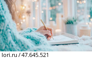 Cozy Winter Journaling: Inspiration and Reflection, capturing the essence of a quiet moment with its warm light, promoting relaxation and mental wellness. Стоковое AI-изображение, AI-художник Данила Большаков / Фотобанк Лори