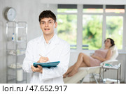 male doctor with folder. Стоковое фото, фотограф Яков Филимонов / Фотобанк Лори