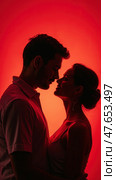 Man and woman in infrared light. Стоковое AI-изображение, AI-художник Sergey Grishin / Фотобанк Лори