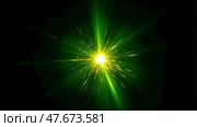 Green laser burst, glowing flare overlay, isolated black background, radiant light effect, graphic element, vibrant energy, digital design, futuristic glow, dynamic shine. Стоковое фото, фотограф Павел Муравьев / Фотобанк Лори