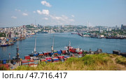 Top view. Vladivostok Commercial Sea Port. Industrial port with containers in Vladivostok. Стоковое видео, видеограф Mikhail Davidovich / Фотобанк Лори