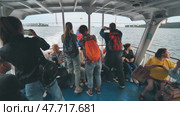 Vladivostok, Russia - August 9, 2021: Tourists ride the ferry on the bay. Редакционное видео, видеограф Mikhail Davidovich / Фотобанк Лори