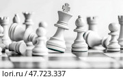 Strategic Game: Chess Pieces on a Board with a Fallen King, Challenge and Strategy in a Monochrome Setting. Стоковое AI-изображение, AI-художник Данила Большаков / Фотобанк Лори