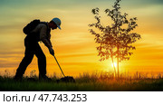 Arbor Day: Planting a Tree at Sunset, Symbolizing Growth and Environmental Stewardship. Стоковое AI-изображение, AI-художник Данила Большаков / Фотобанк Лори