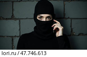 Mysterious androgynous portrait in balaclava. Стоковое AI-изображение, AI-художник Андрей Бакусов / Фотобанк Лори