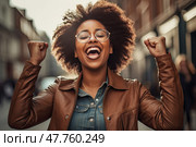 Portrait of carefree young african american woman шт glasses threw up her hands with clenched fists and celebrates win at city outdoors, created with Generative AI. Стоковое AI-изображение, AI-художник Данила Большаков / Фотобанк Лори