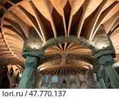 SANTA COLOMA DE CERVELLO, SPAIN - DECEMBER 30, 2022: Inticate geometric shapes of stucture of roof of Colonia Guell. Редакционное фото, фотограф Яков Филимонов / Фотобанк Лори