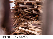 Wooden Pallets Piled at Construction Site Create Chaotic Outdoor Atmosphere. Стоковое фото, фотограф Aleksandr Golubev / Фотобанк Лори