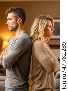 Couple having relationship problems are standing back to back with arms crossed. Стоковое AI-изображение, AI-художник Юрий Поздников / Фотобанк Лори