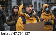 A man wearing a yellow jacket securely grips a box with both hands. Стоковое AI-изображение, AI-художник Данила Большаков / Фотобанк Лори