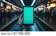 A person is presenting a blank tablet at a bustling subway station filled with commuters during peak travel time. Стоковое AI-изображение, AI-художник Данила Большаков / Фотобанк Лори