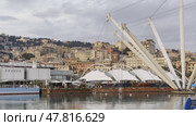 Port view in Genova Italy with architectural landmarks and colorful hillside buildings. Редакционное видео, видеограф Антон Гвоздиков / Фотобанк Лори