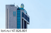 Moscow, Russia, April 04, 2025: SBER office building in Moscow. Редакционное фото, фотограф Igor Skripachev / Фотобанк Лори