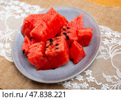 In plate there is small portion of watermelon pulp, useful cubes. Стоковое фото, фотограф Яков Филимонов / Фотобанк Лори