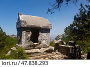 Reliefs on sarcophagus rock tombs at unique Southwest necropolis Termessos ancient city. Стоковое фото, фотограф Яков Филимонов / Фотобанк Лори