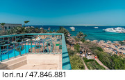 Panorama view of the hotel with a pool and the Red Sea with ships boats in Egypt (2021 год). Стоковое фото, фотограф Артем Курутин / Фотобанк Лори