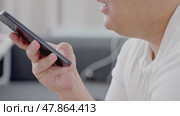 Man using ChatGPT in the mobile phone. This app is a chatbot based on Artificial Intelligence developed by OpenAI. Dubai, UAE: 07.05.2025. High quality. Стоковое видео, видеограф Feruza Tashmetova / Фотобанк Лори
